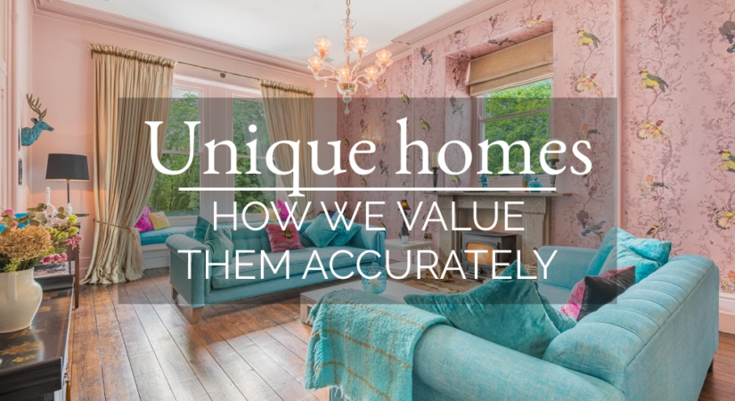Lounge with teal sofas and pink bird wallpaper